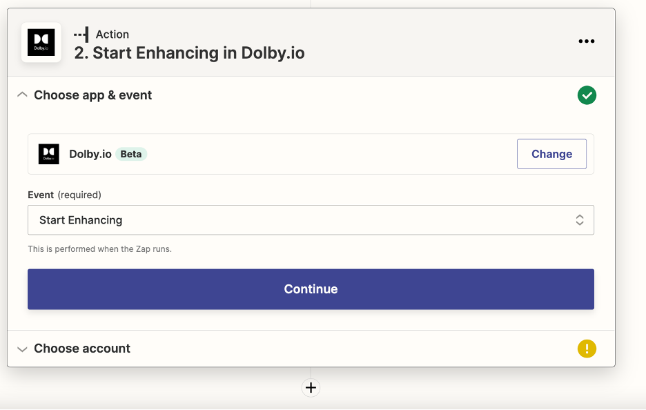 Pictured is the first action settings menu to use 'Start Enhancing in Dolby.io'. The app chosen is Dolby.io and the event chosen is 'Start Enhancing.' At the bottom of the screen is a large, blue, rectangular button for the user to press to continue.