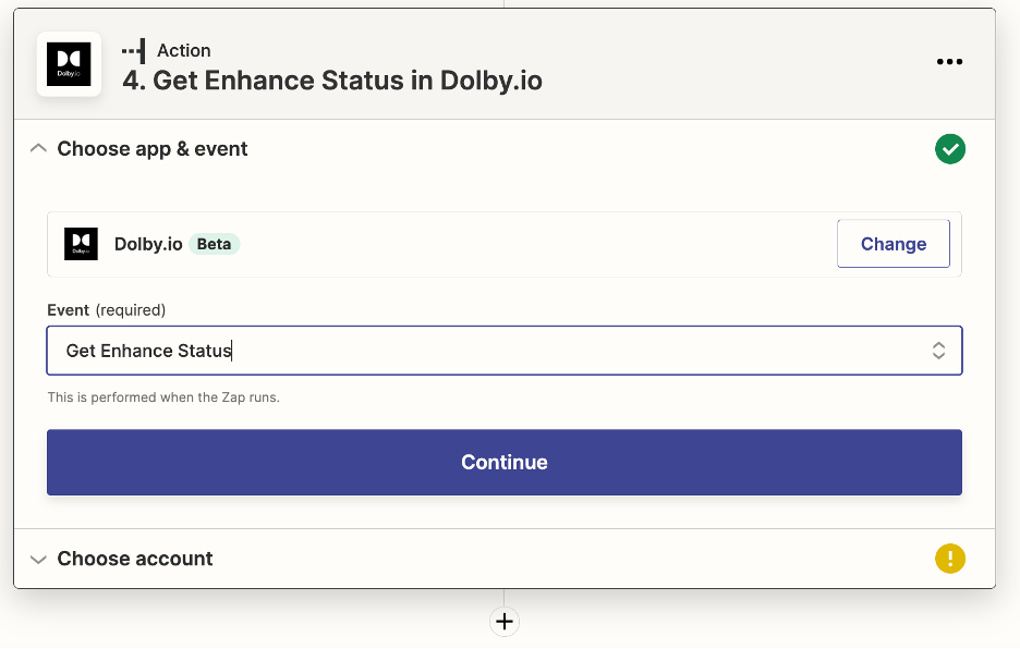 Pictured is the 'Choose app & event' menu for a new action. The event selected is 'Get Enhance Status' from the app 'Dolby.io.' At the bottom, there is a large, blue, rectangular button that says 'Continue' for the user to press.