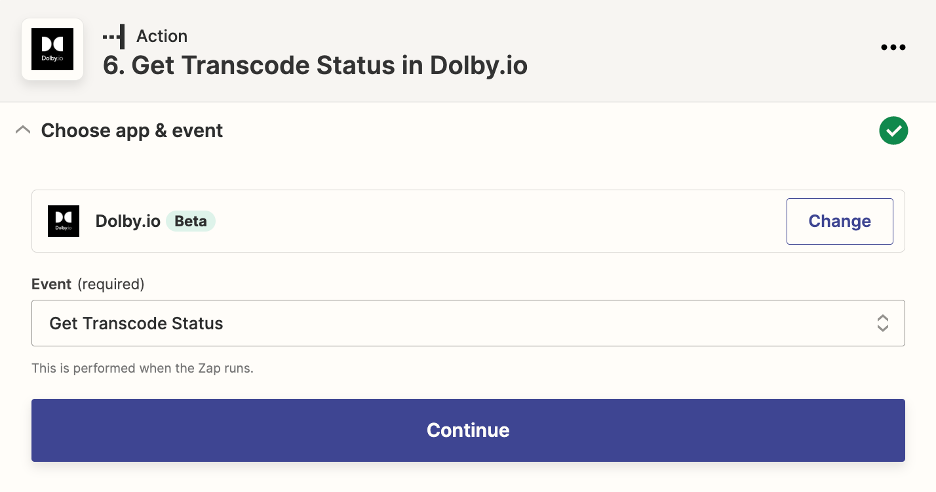 This is a new action menu for the app 'Dolby.io' and the 'Event' selected in the drop down box is 'Get Transcode Status'. 
At the bottom is a blue rectangular button that says 'Continue'