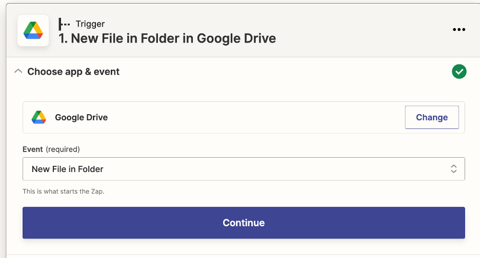 Shown is the menu for the trigger 'New File in Folder in Google Drive.' The event selected is 'New File in Folder.' There is a large, blue, rectangle at the bottom that says 'Continue' for the user to press.