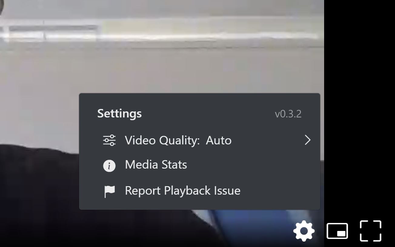 Image showing the settings panel on the dolby.io stream viewer with video quality set to auto. The image also depicts a media stats button and the option to report playback issues.